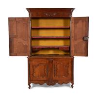 A Louis XV Provincial Cherry Stepback Cupboard