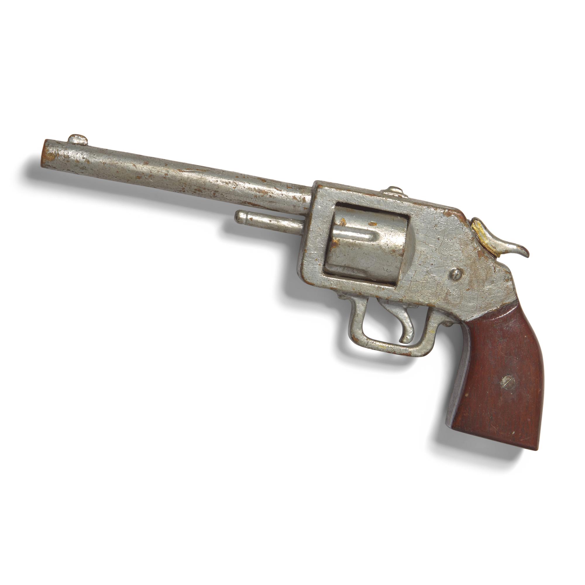 A Carved and Painted Wood Model of a Pistol