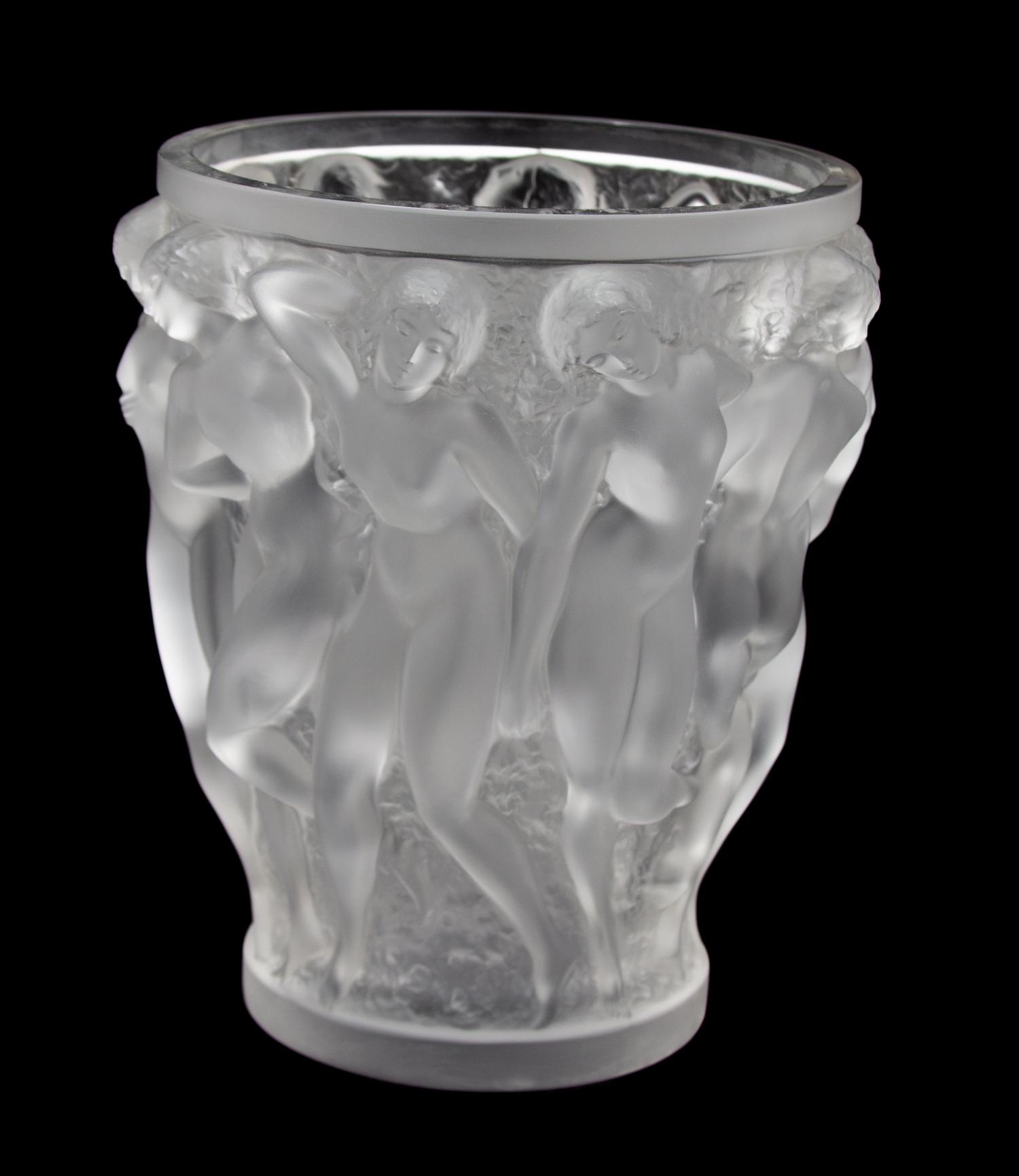 A Lalique Molded and Frosted Glass Bacchantes Vase Height 9 1/2 inches. — 20TH CENTURY