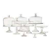 A Group of Nine Blown and Cast Glass Footed Cake Plates and Covers
