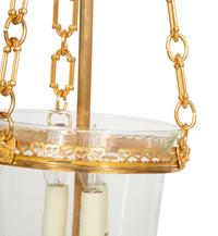 A Pair of French Gilt Metal and Glass Lanterns