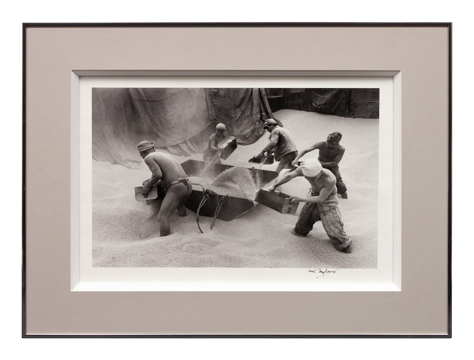 A group of four photographs ( Ministers Meeting, Rome, 1940; Preparing the Land to Plant Rice , 1949; Unloading Rice at Kobe , 1949; Bricks for Building, Greenbelt, MD, c. 1939)