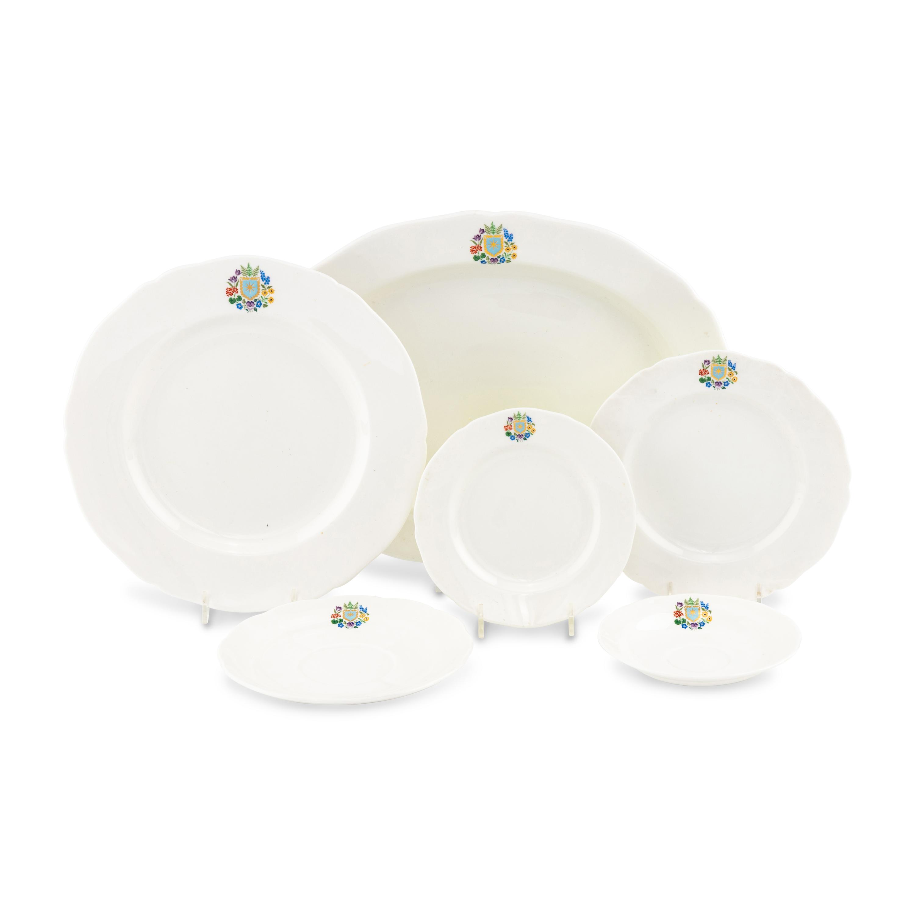 A Spode Porcelain Dinner Service for Fifteen in the Floral Armorial Pattern