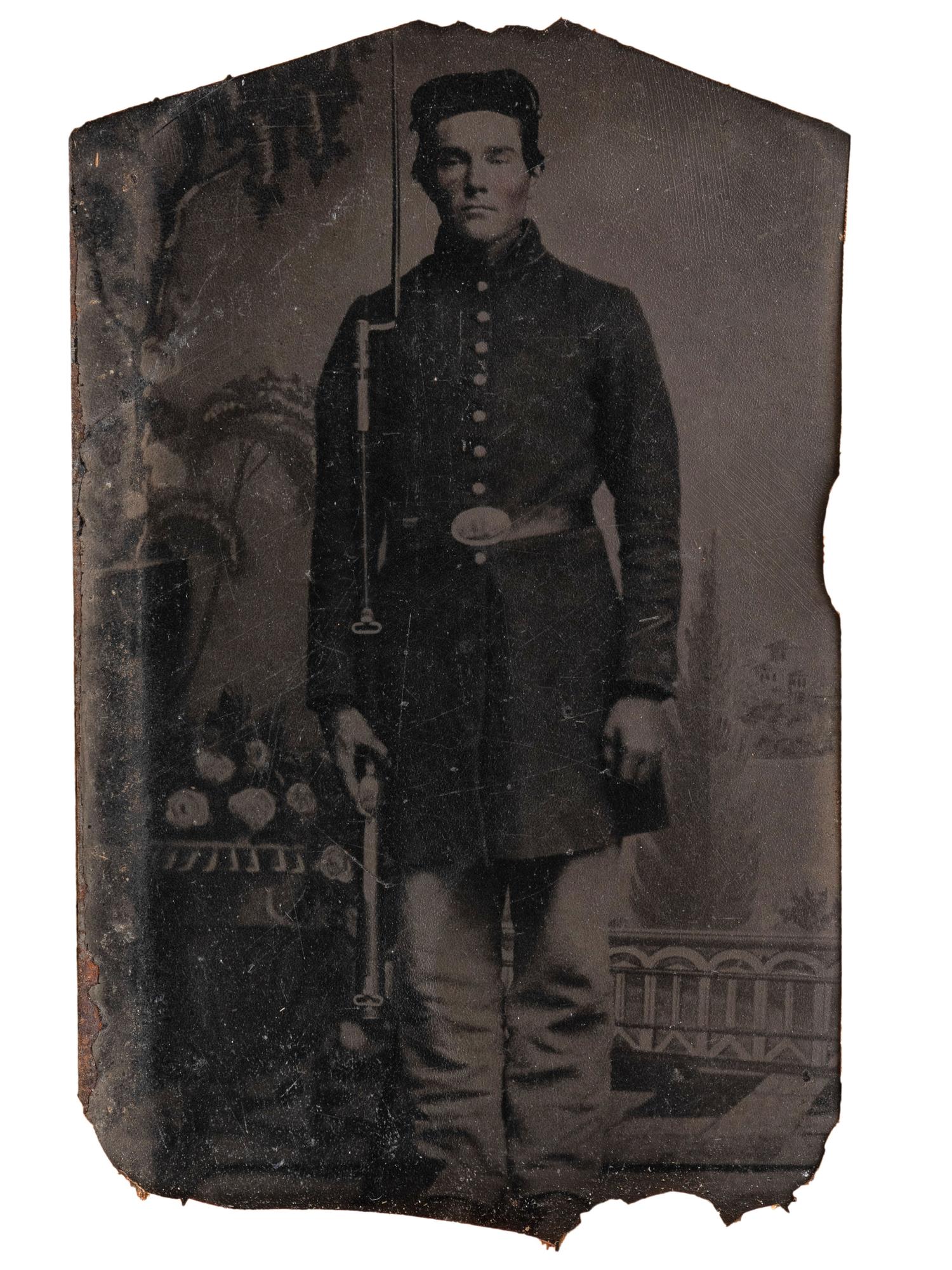 [CIVIL WAR]. Tintype of soldier housed in folk art carved stone frame.