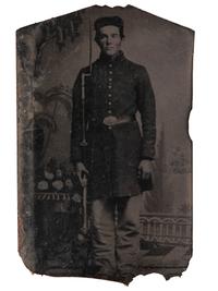 [CIVIL WAR]. Tintype of soldier housed in folk art carved stone frame.