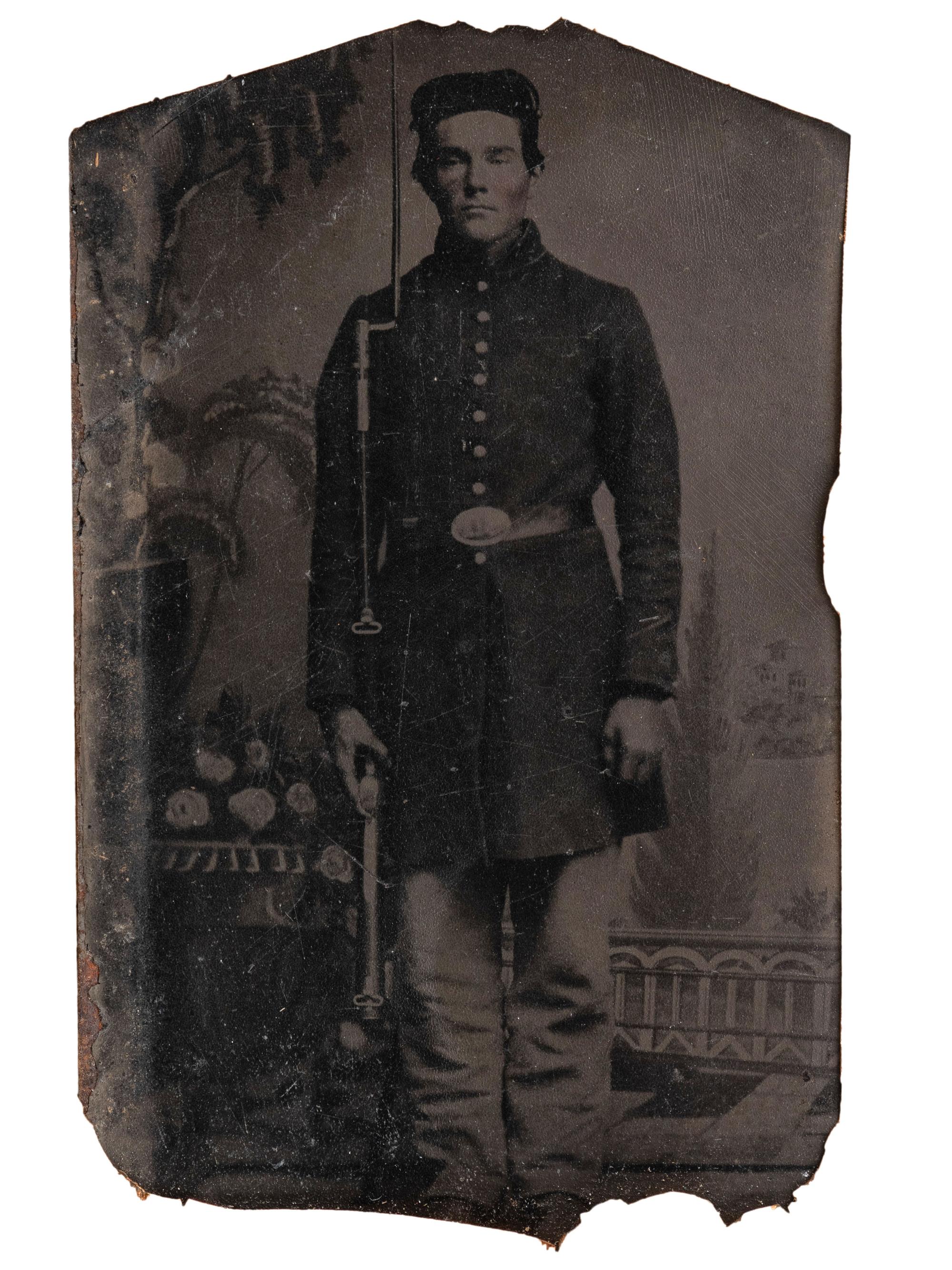 [CIVIL WAR]. Tintype of soldier housed in folk art carved stone frame.