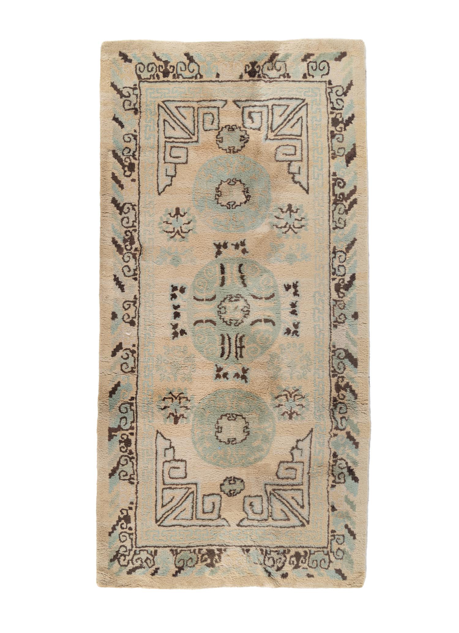 A Khotan Wool Rug and Another Rug