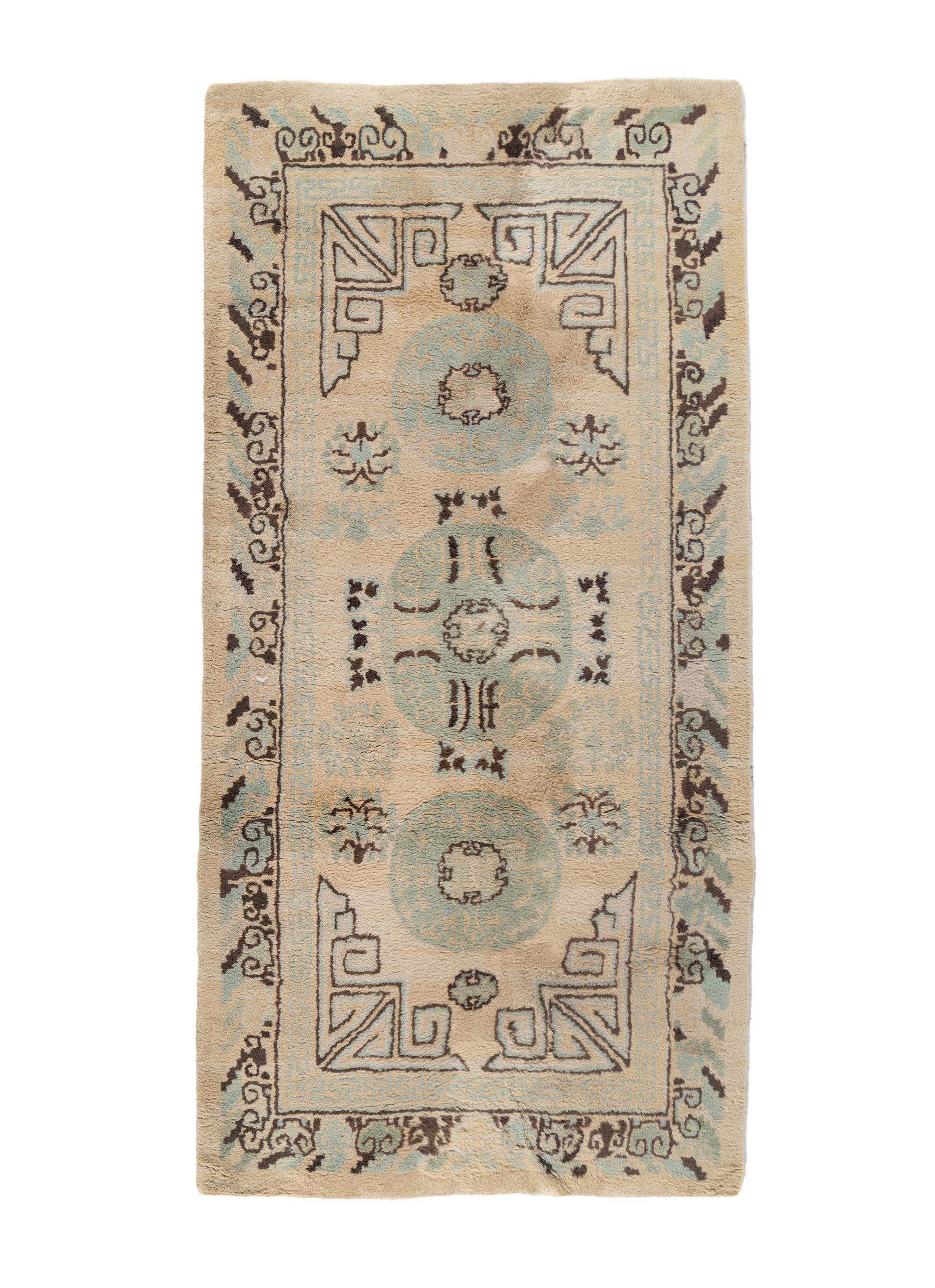 A Khotan Wool Rug and Another Rug