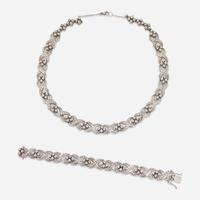 A Matching Set of 14K White Gold and Diamond Necklace and Bracelet