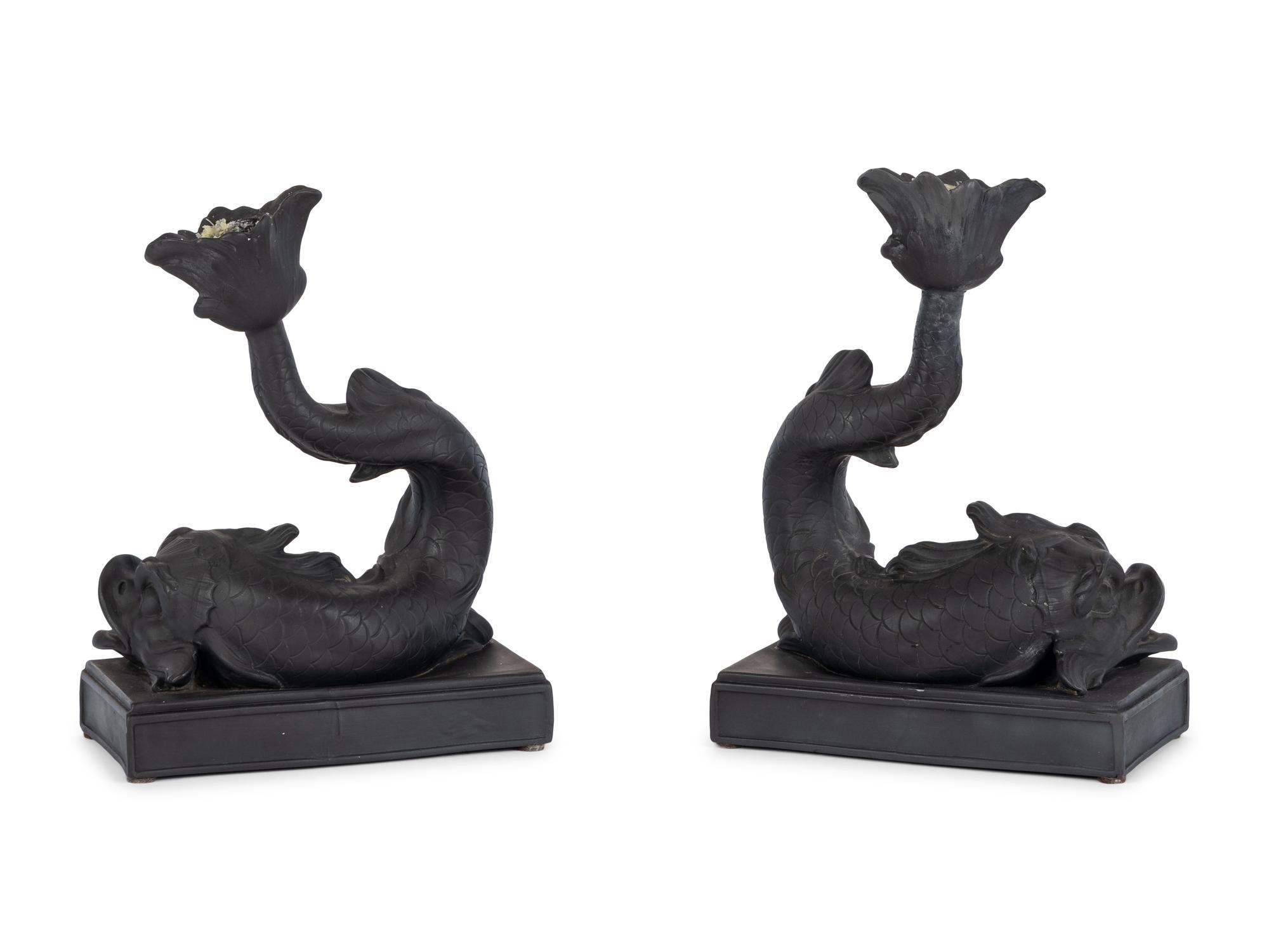 A Pair of Wedgwood Basalt Dolphin Candlesticks