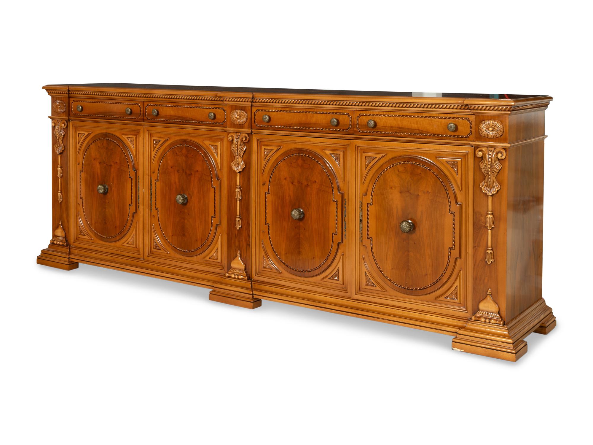 A Large Italian Baroque Style Fruitwood Credenza