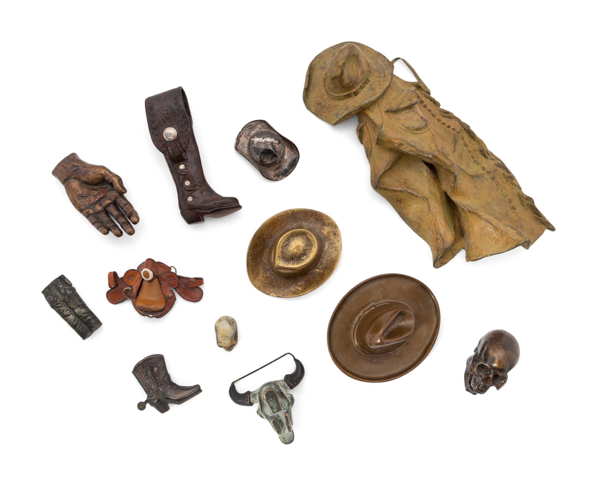 A Group of Eleven Miniature Bronze Western Objects