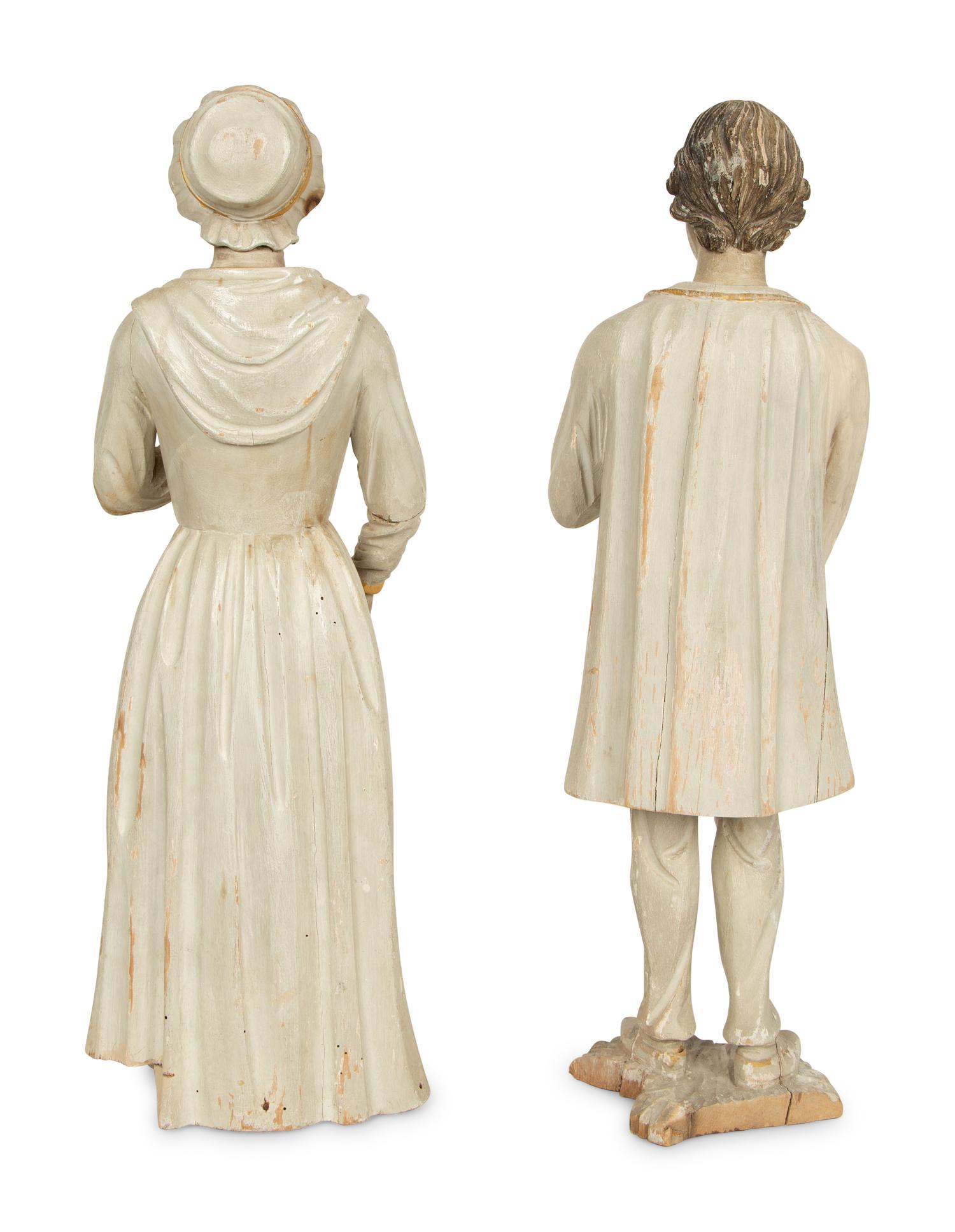 A Pair of Continental Folk Art Painted Figures — 19TH CENTURY