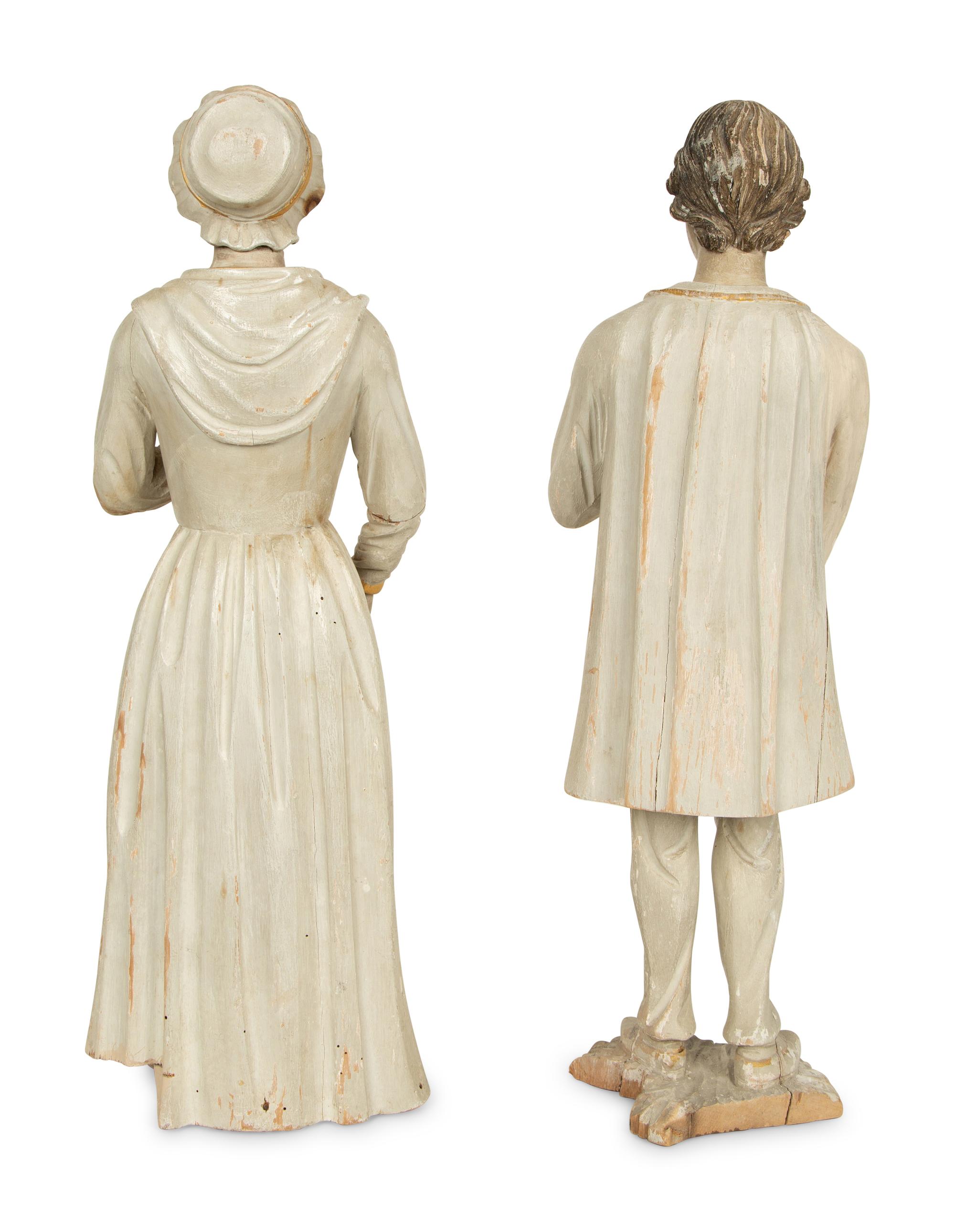 A Pair of Continental Folk Art Painted Figures — 19TH CENTURY