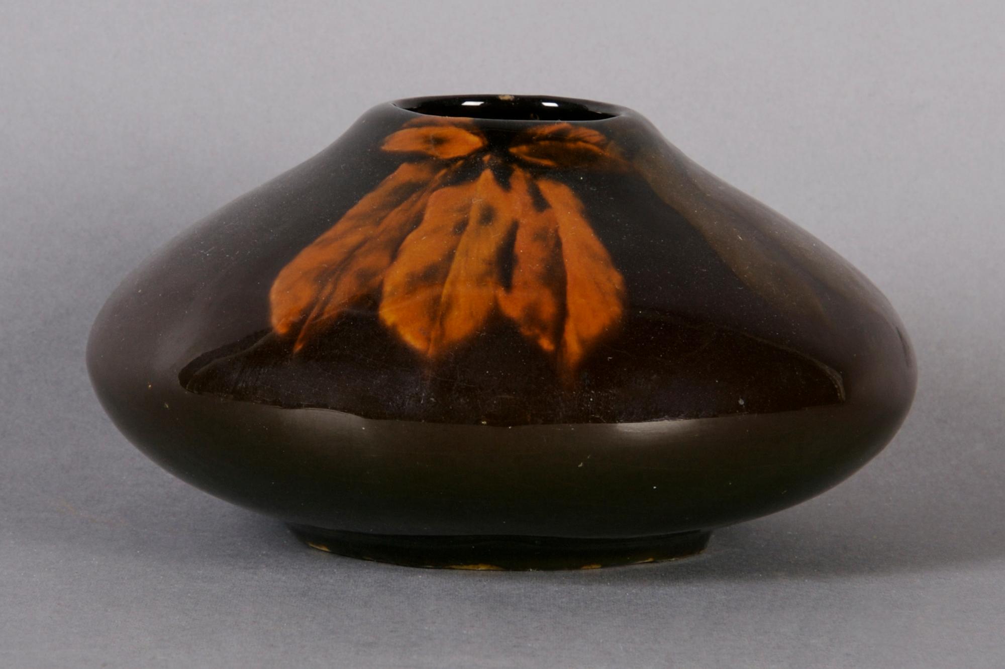 A Weller Louwelsa Pottery Vase, Height 2 3/4 inches.