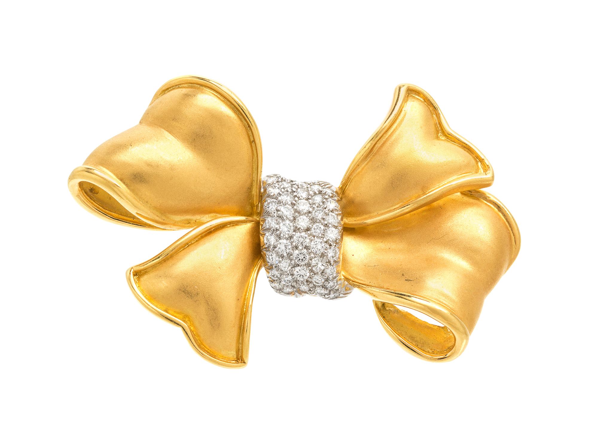An 18 Karat Yellow Gold, Platinum and Diamond Bow Brooch, 16.30 dwts.