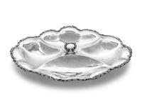 with center handle and foliate scalloped edge.