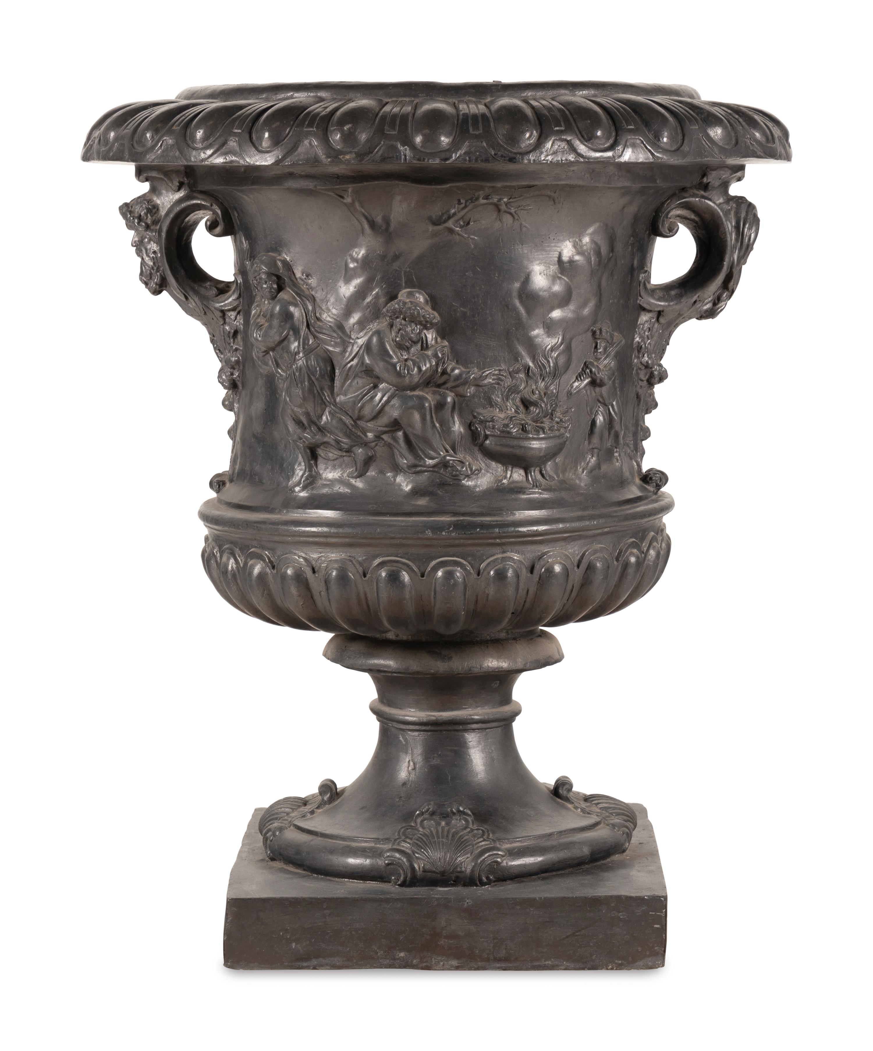 A Pair of English Lead Allegorical Garden Urns