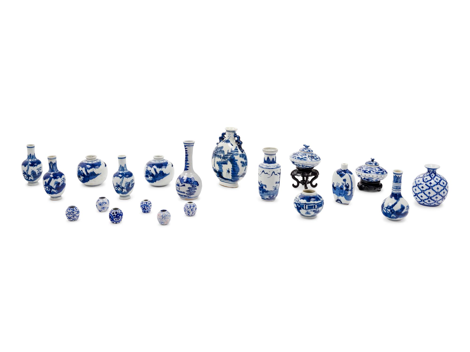 Twenty Small Blue and White Porcelain Vessels