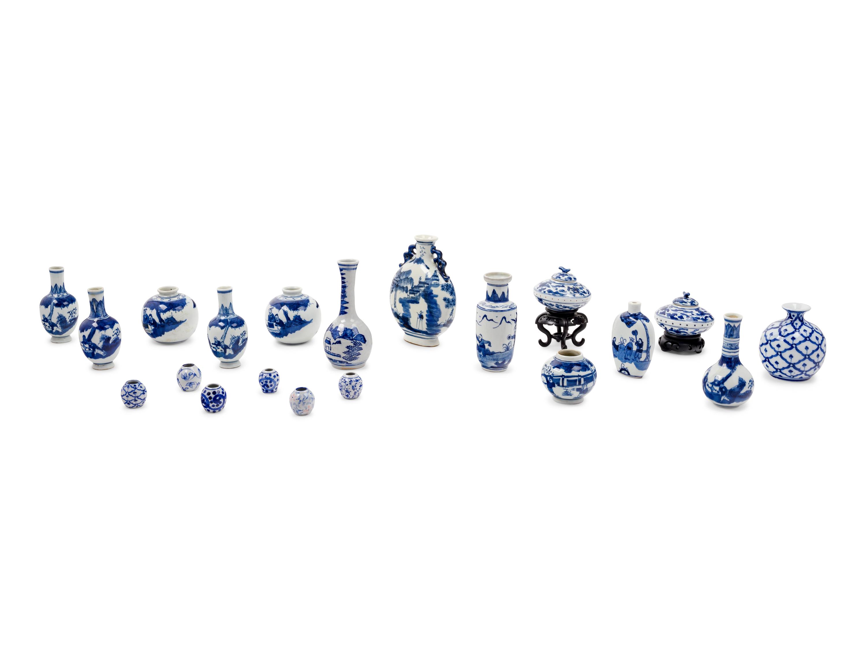 Twenty Small Blue and White Porcelain Vessels