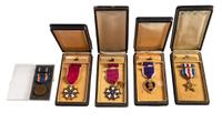 [WORLD WAR II AND PRE-WAR]. A group of 5 medals, including a Purple Heart, two Legion of Merit and one Silver Star.