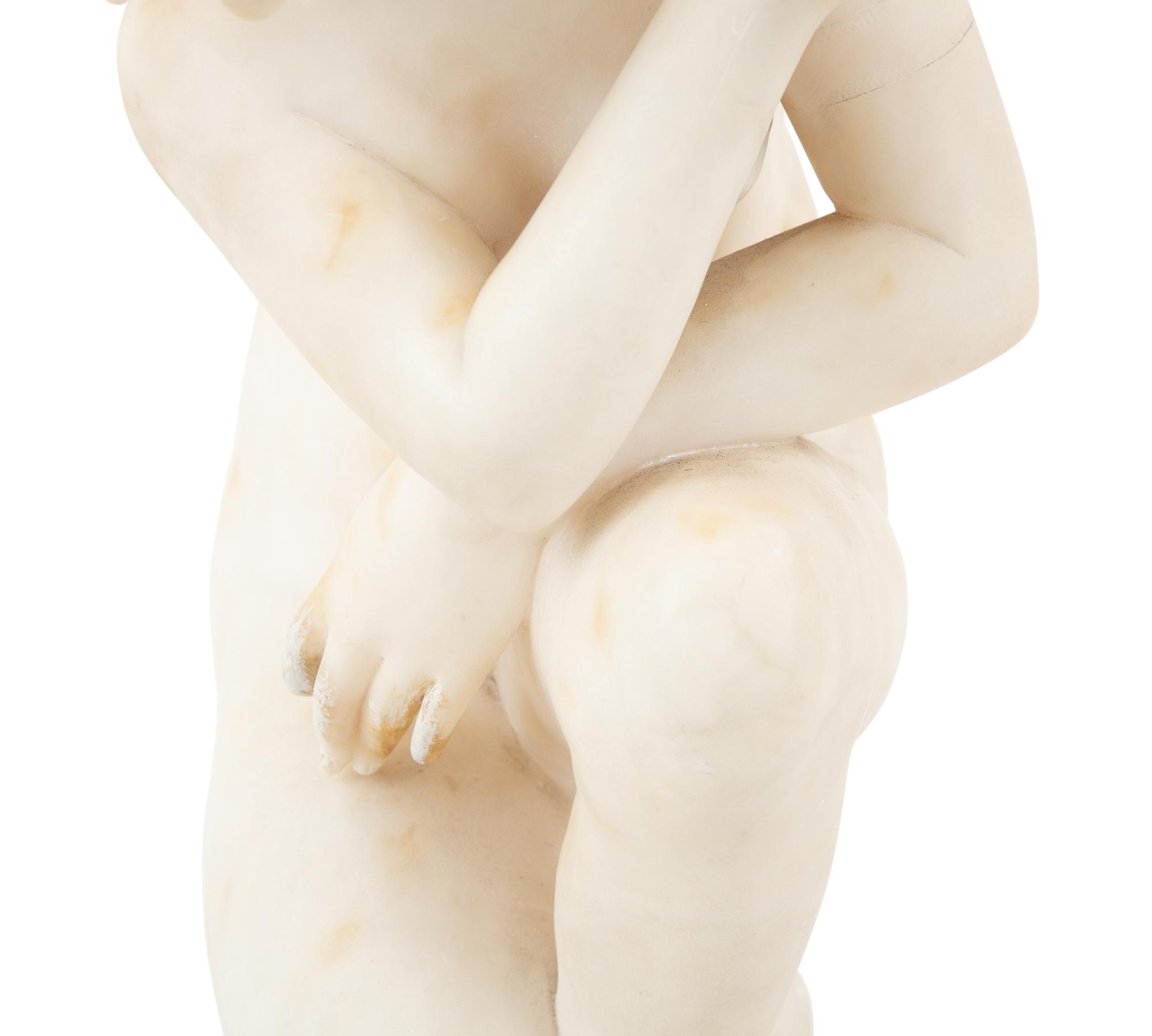 A Continental Alabaster Crouching Venus