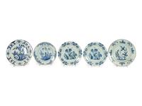 A Group of Thirteen Delft Earthenware Plates and Chargers