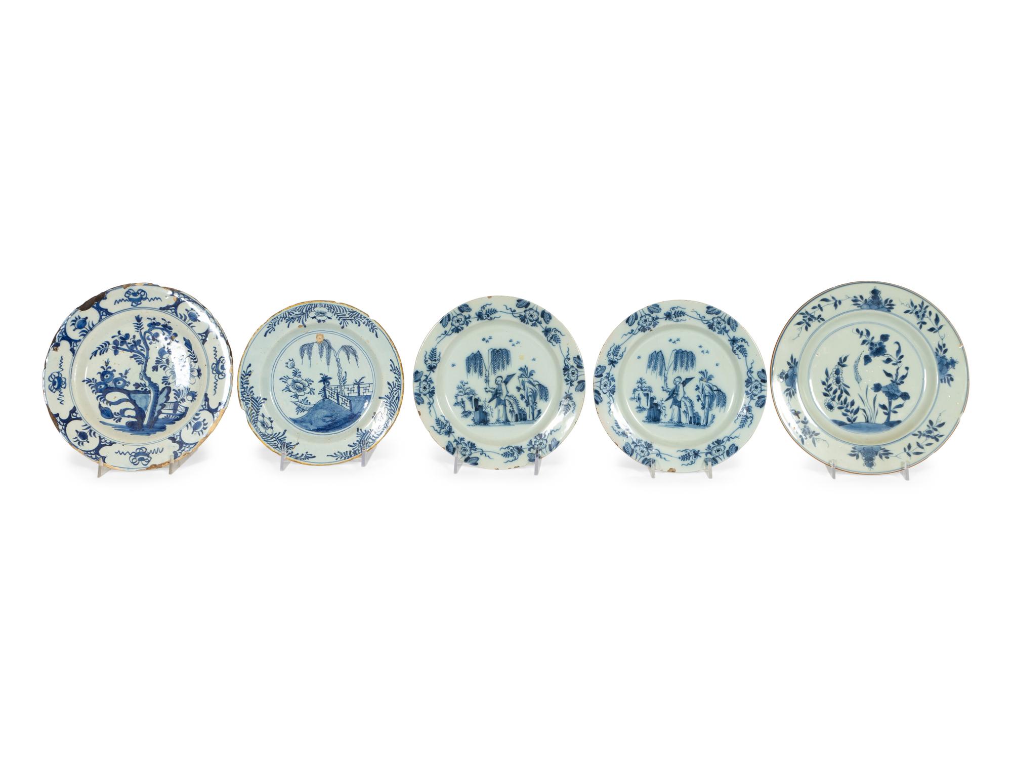 A Group of Thirteen Delft Earthenware Plates and Chargers