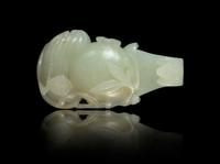 A Carved Pale Celadon Jade Belt Hook Length 3 3/8 inches. — 18TH/19TH CENTURY