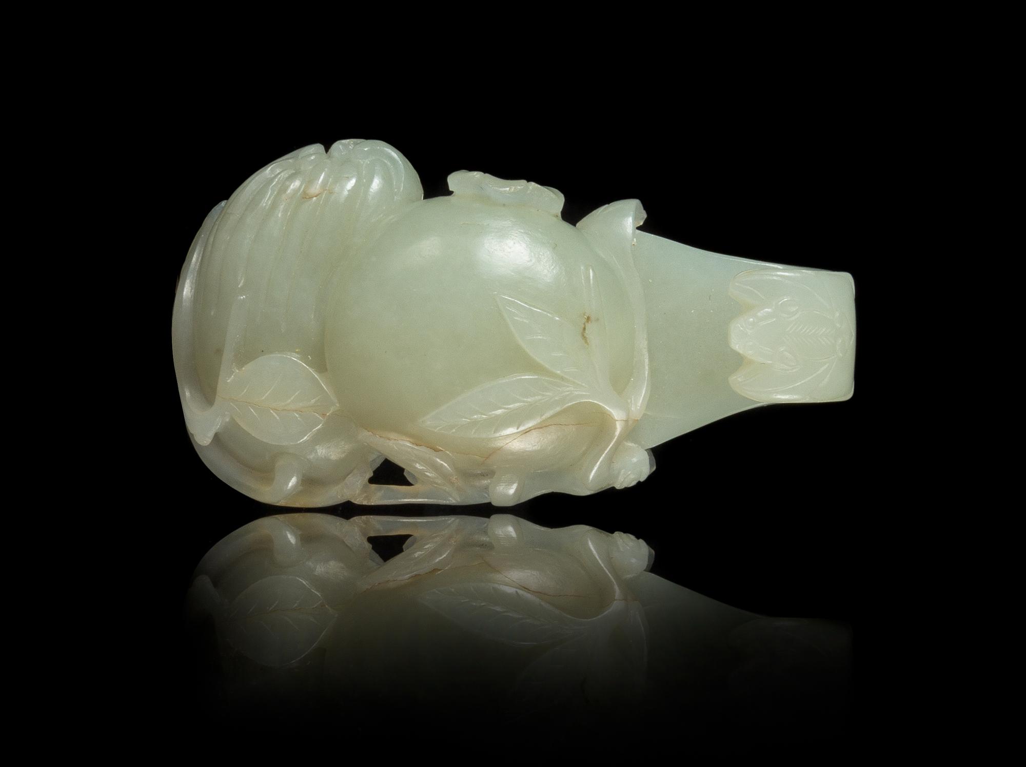 A Carved Pale Celadon Jade Belt Hook Length 3 3/8 inches. — 18TH/19TH CENTURY