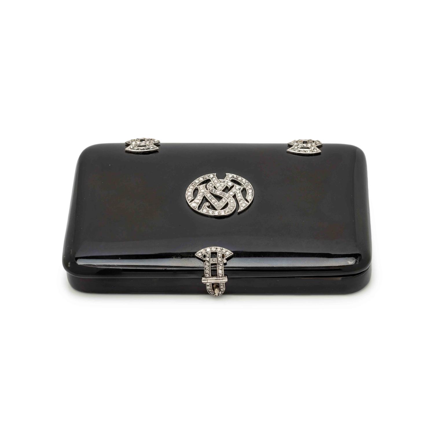 A Cartier Art Deco Diamond and Platinum-Mounted Enamel Compact