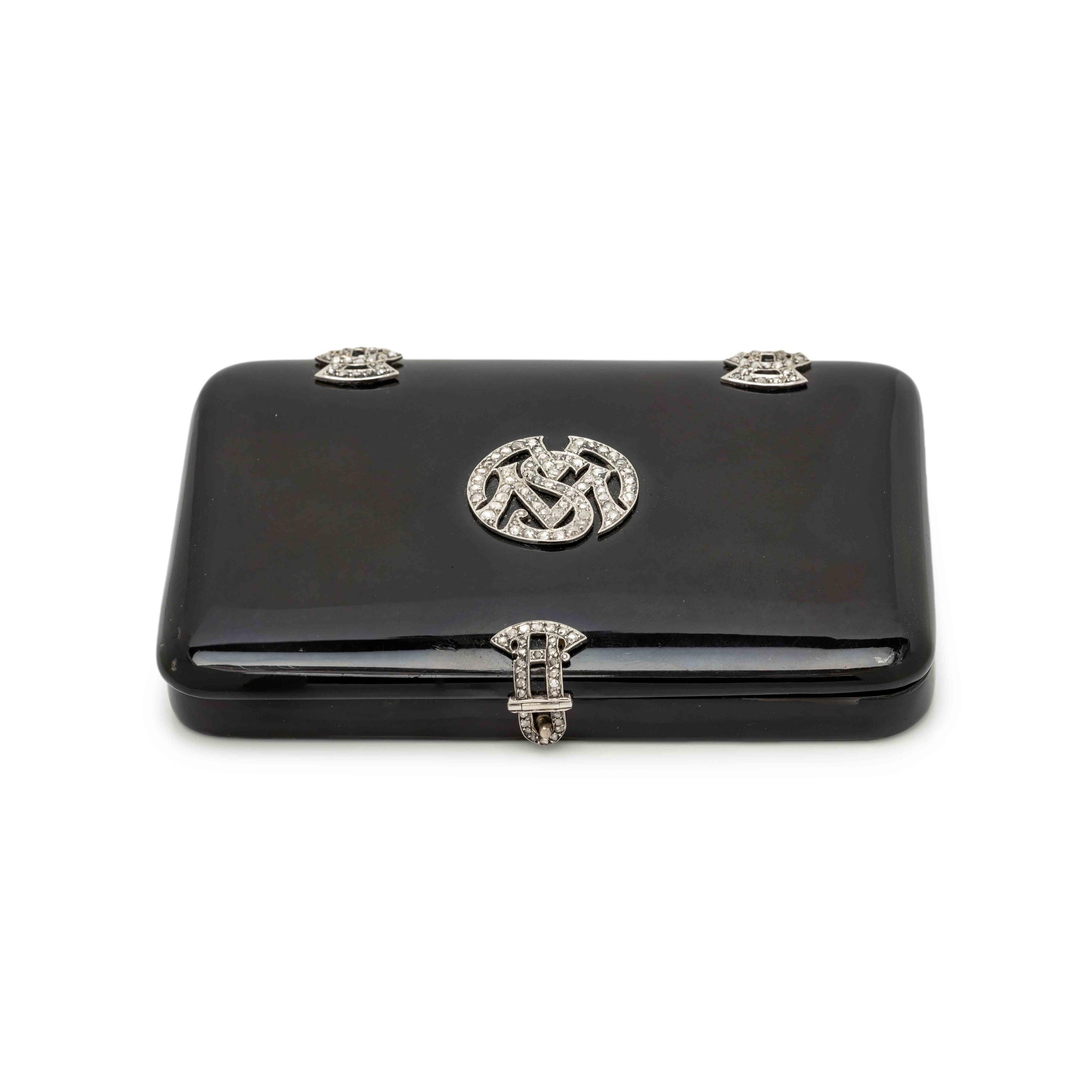 A Cartier Art Deco Diamond and Platinum-Mounted Enamel Compact