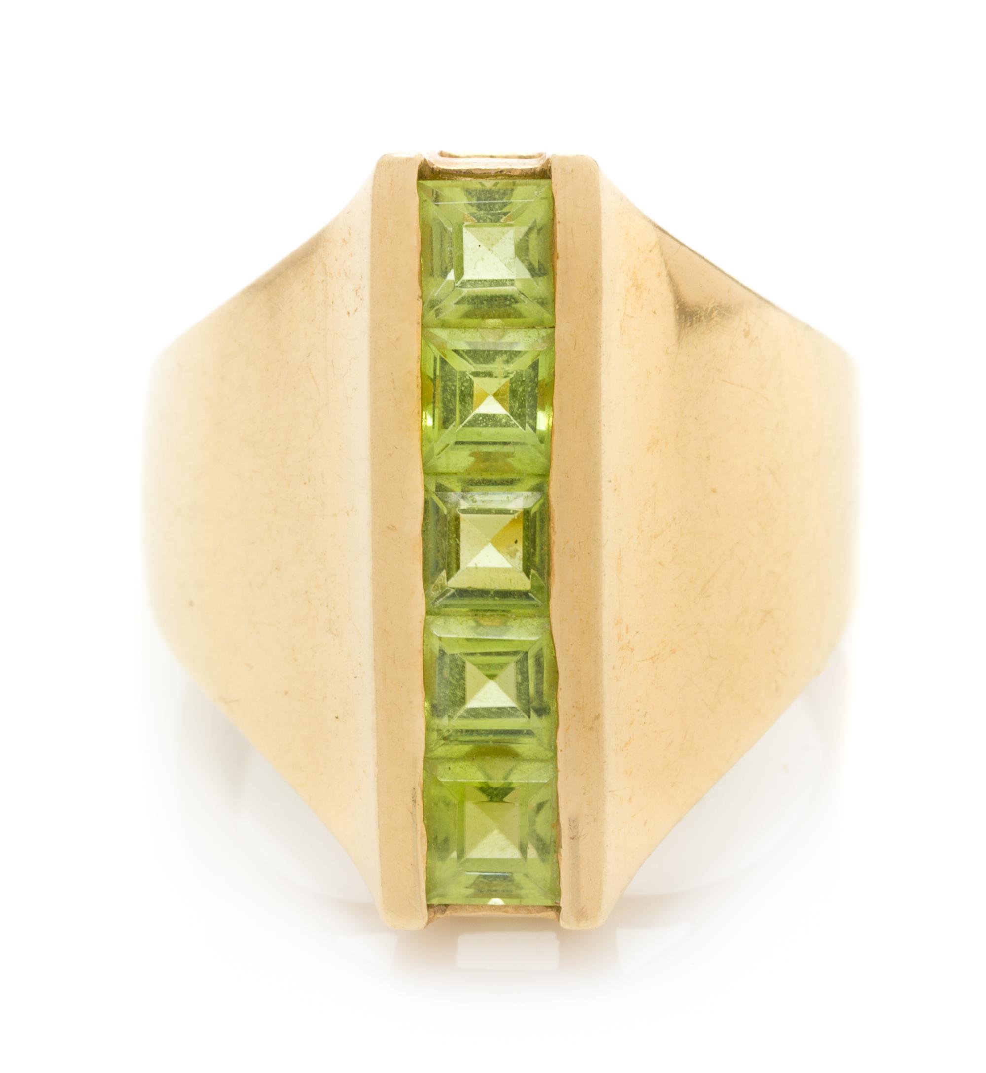 A 14 Karat Yellow Gold and Peridot Ring, 6.10 dwts.