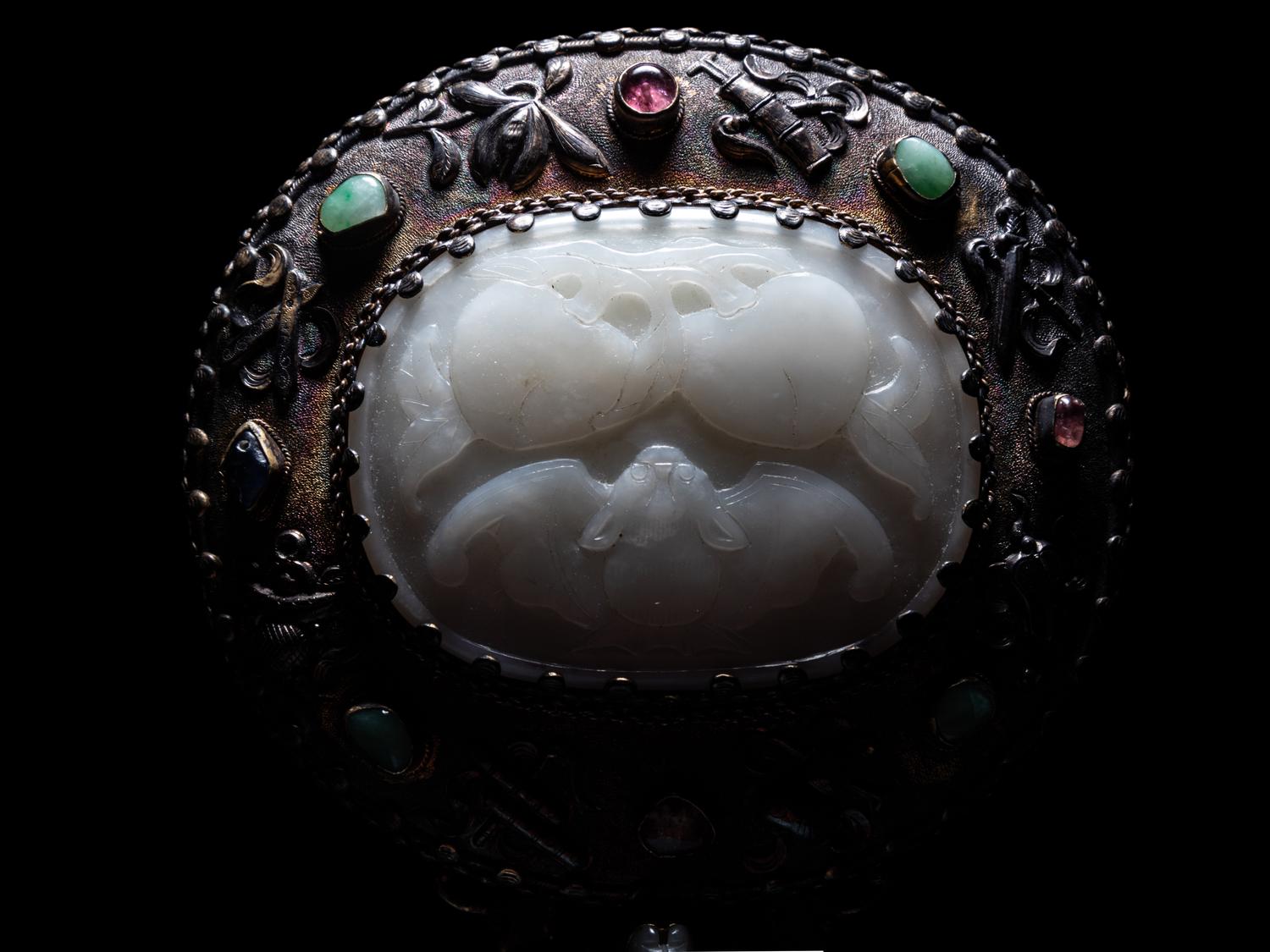 A White Jade Mounted and Hardstone Embellished Hand Mirror