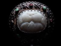 A White Jade Mounted and Hardstone Embellished Hand Mirror