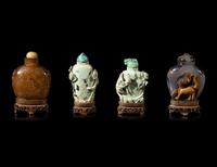 Four Chinese Carved Hardstone Snuff Bottles