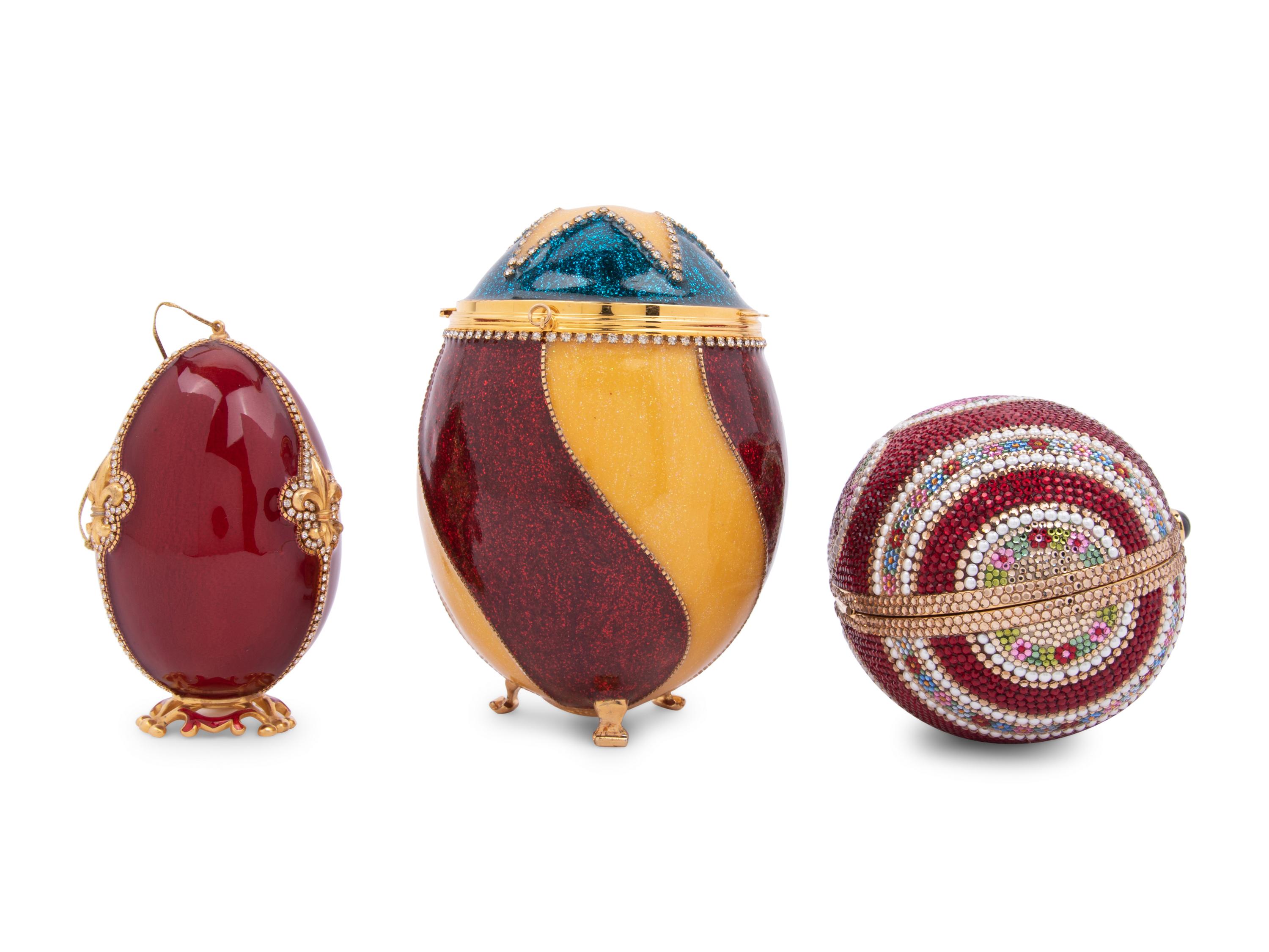 Three Egg Shaped Accessories: One Judith Leiber Fabergé Egg Minaudière, One Vivian Alexander Bag, and One Ornament