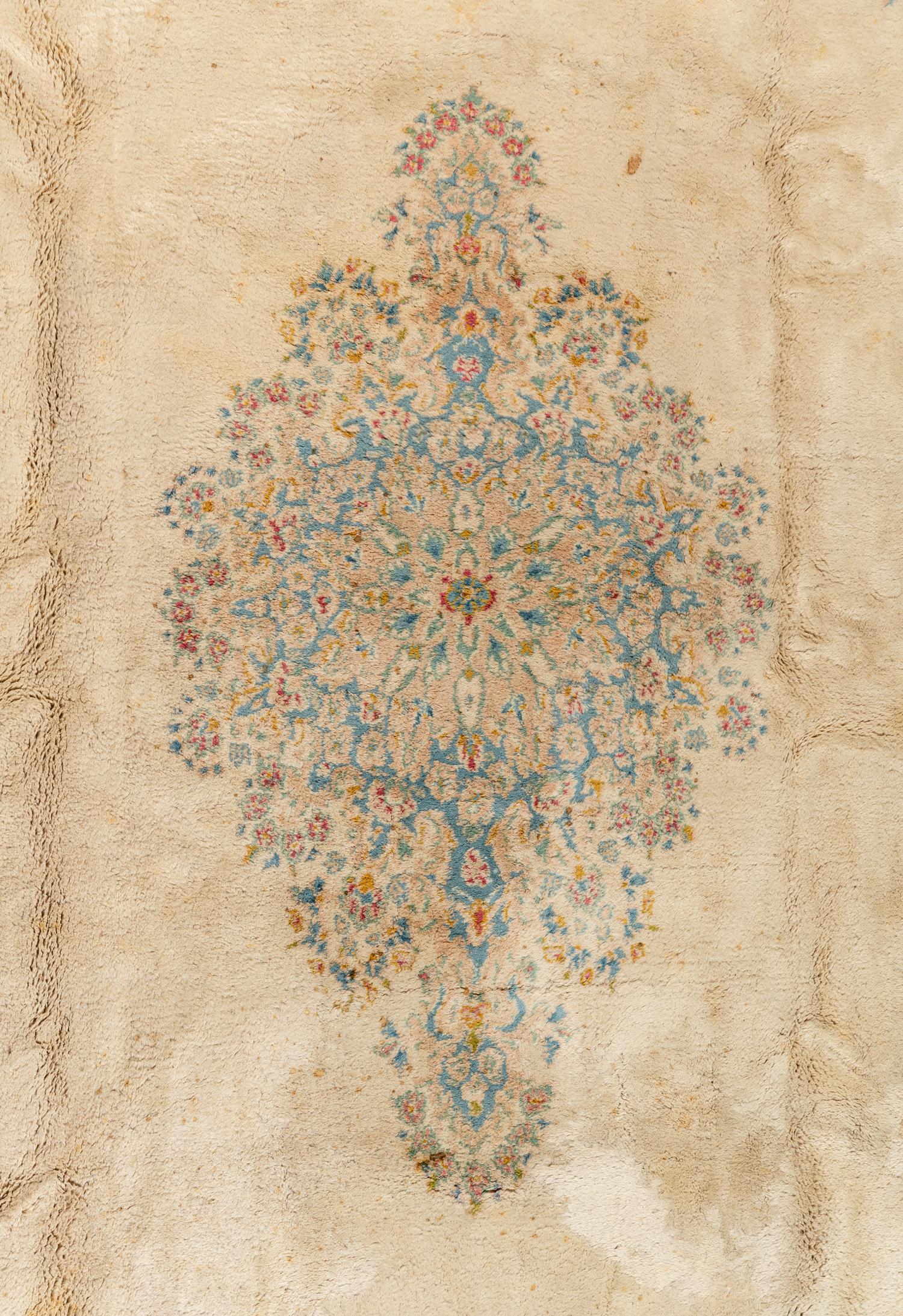 A Kirman Wool Rug