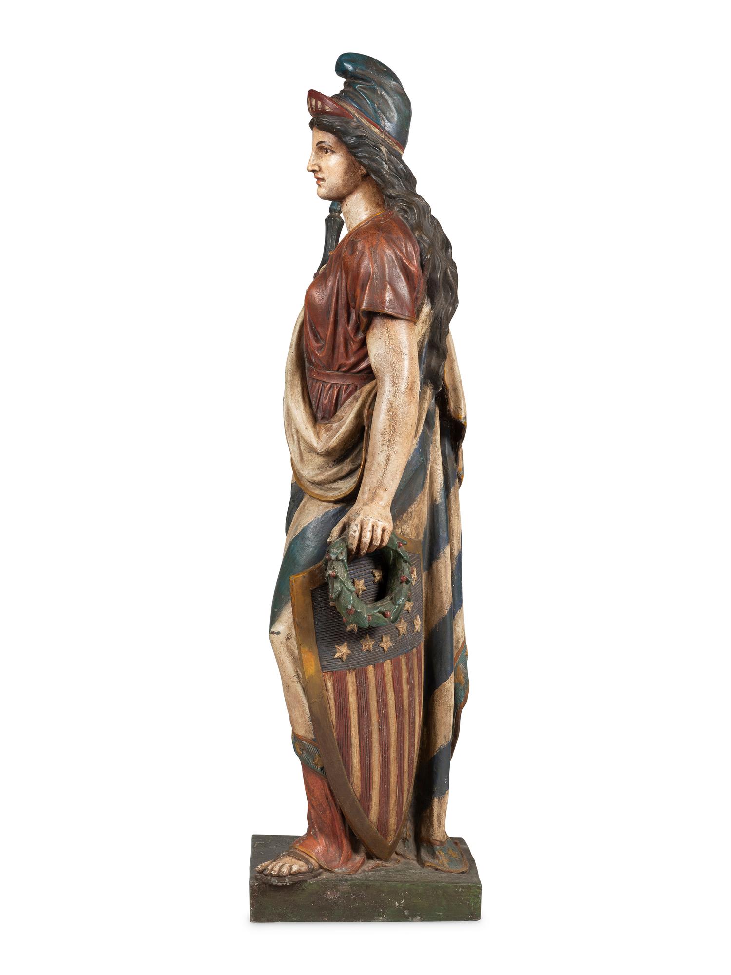 A Polychrome Painted Cast Zinc Goddess of Liberty Figure