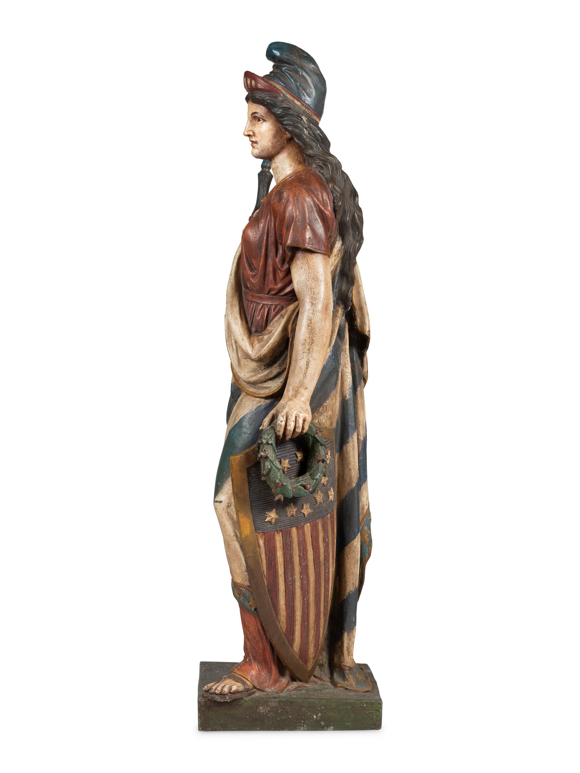 A Polychrome Painted Cast Zinc Goddess of Liberty Figure