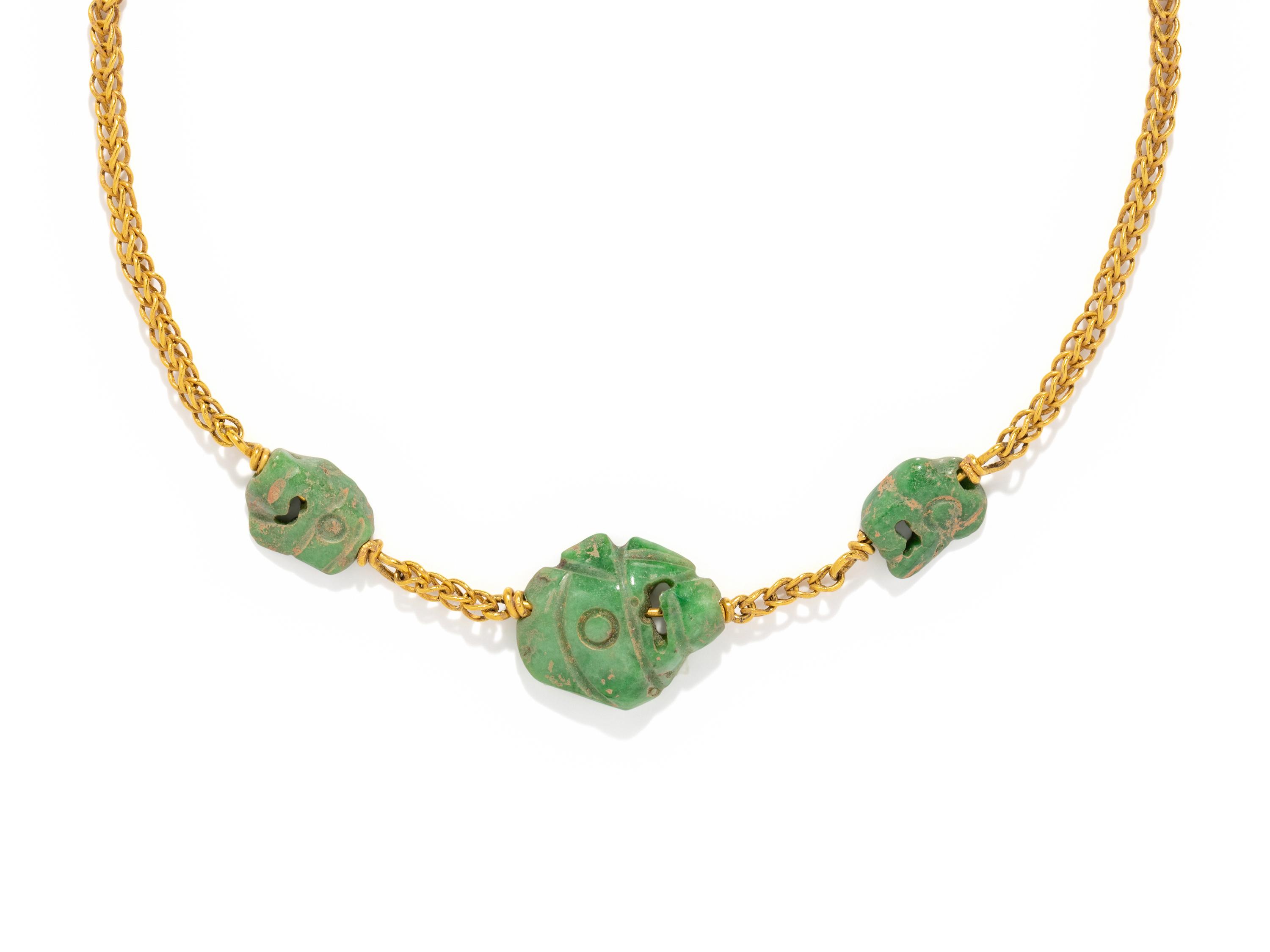 Three Maya Jade Parrot Pendants — Strung on a gold necklace