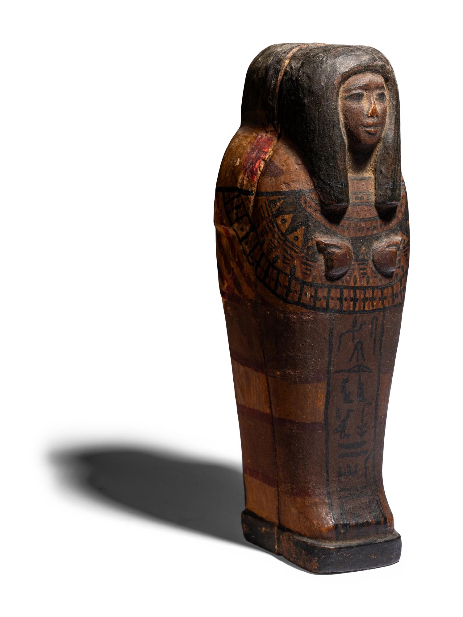 An Egyptian Style Painted Wood Ushabti Coffin