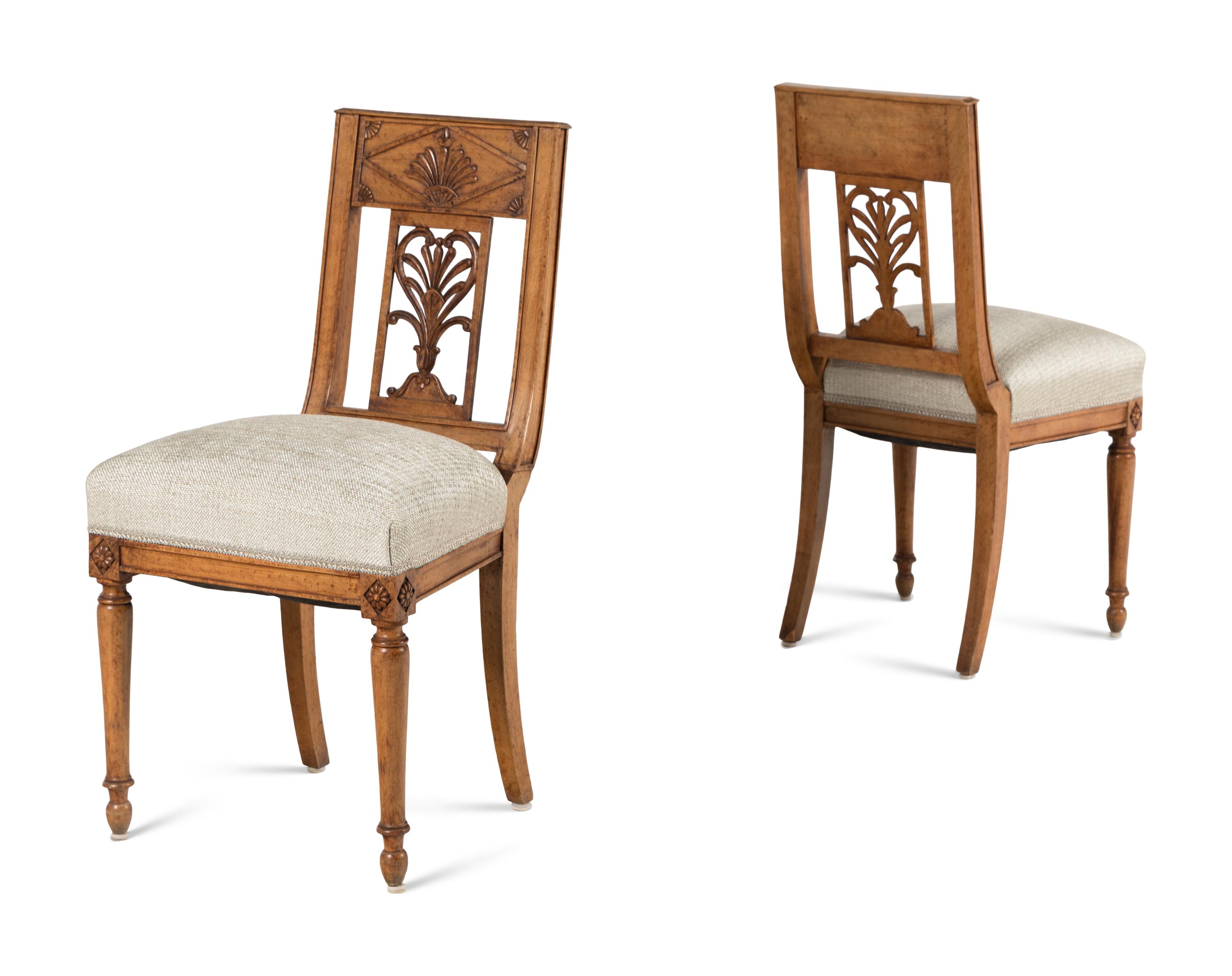 A Pair of Charles X Fruitwood Side Chairs