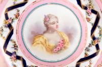 A Set of Twelve Sèvres Style Porcelain Plates Depicting Courtiers