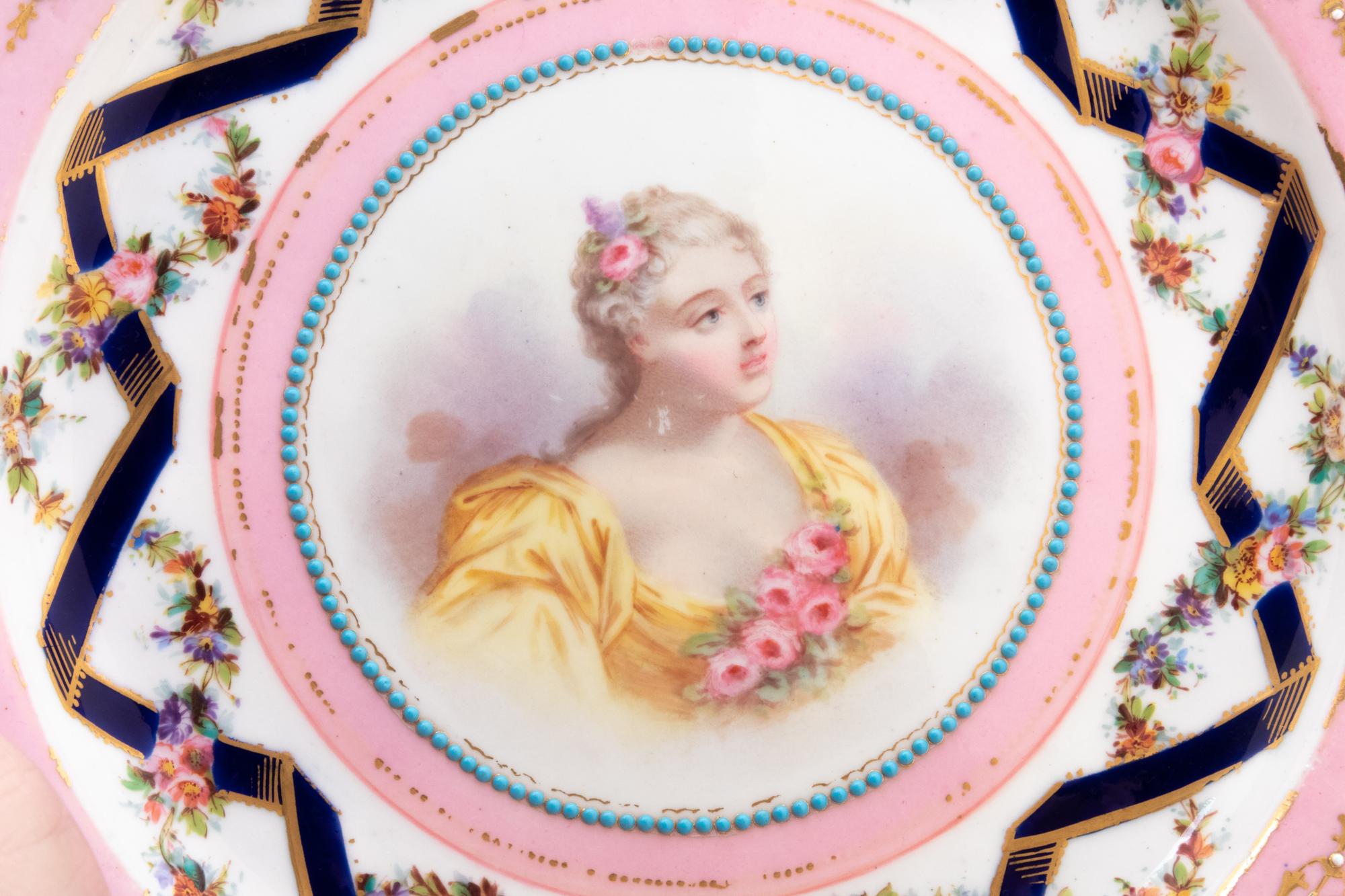 A Set of Twelve Sèvres Style Porcelain Plates Depicting Courtiers