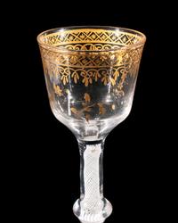 A Giles Gilt Decorated Opaque Twist Knopped Wine Glass