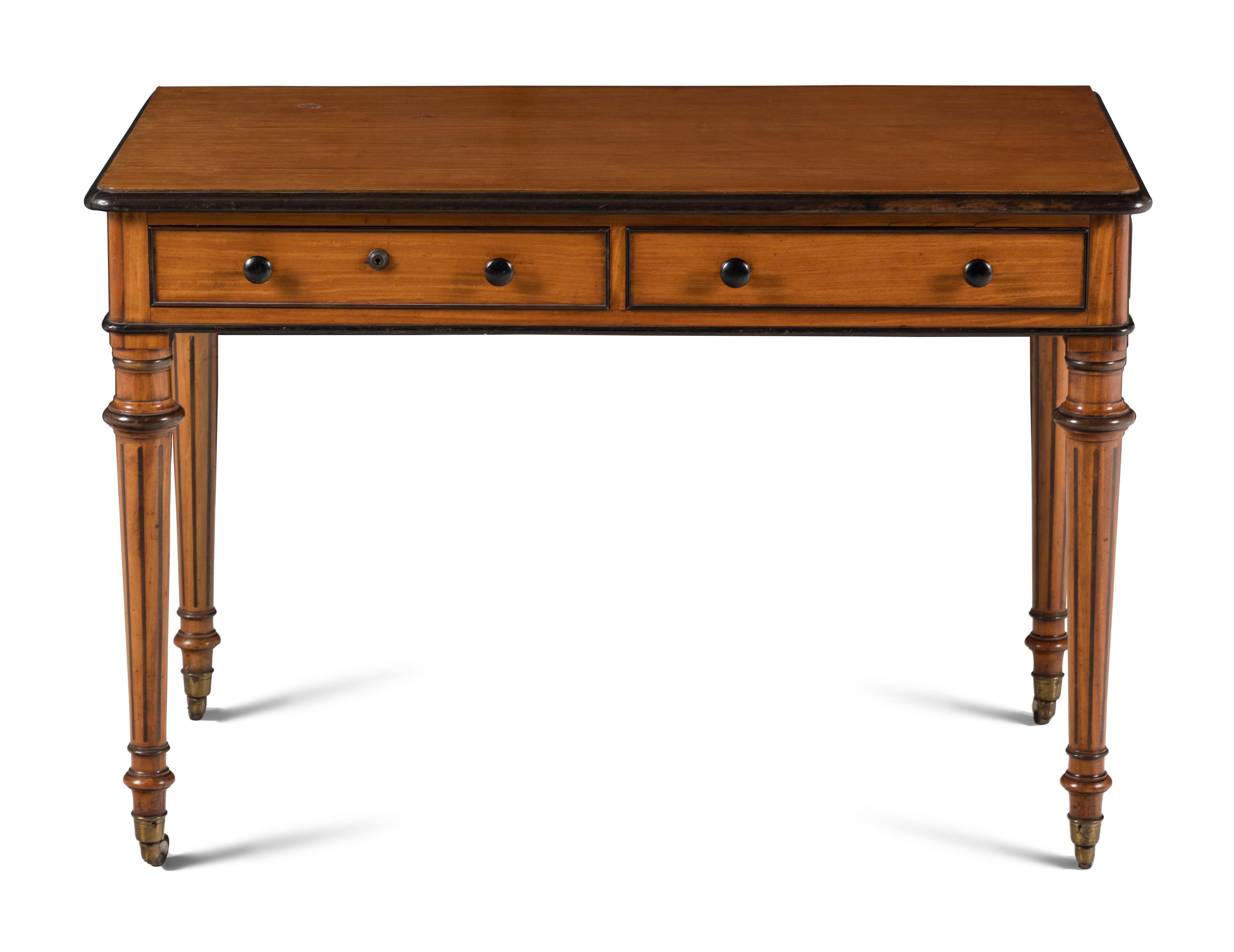 An English Satinwood and Parcel-Ebonized Dressing Table