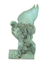 A Patinated Cast Metal Eagle Architectural Ornament with Verdigris Patina