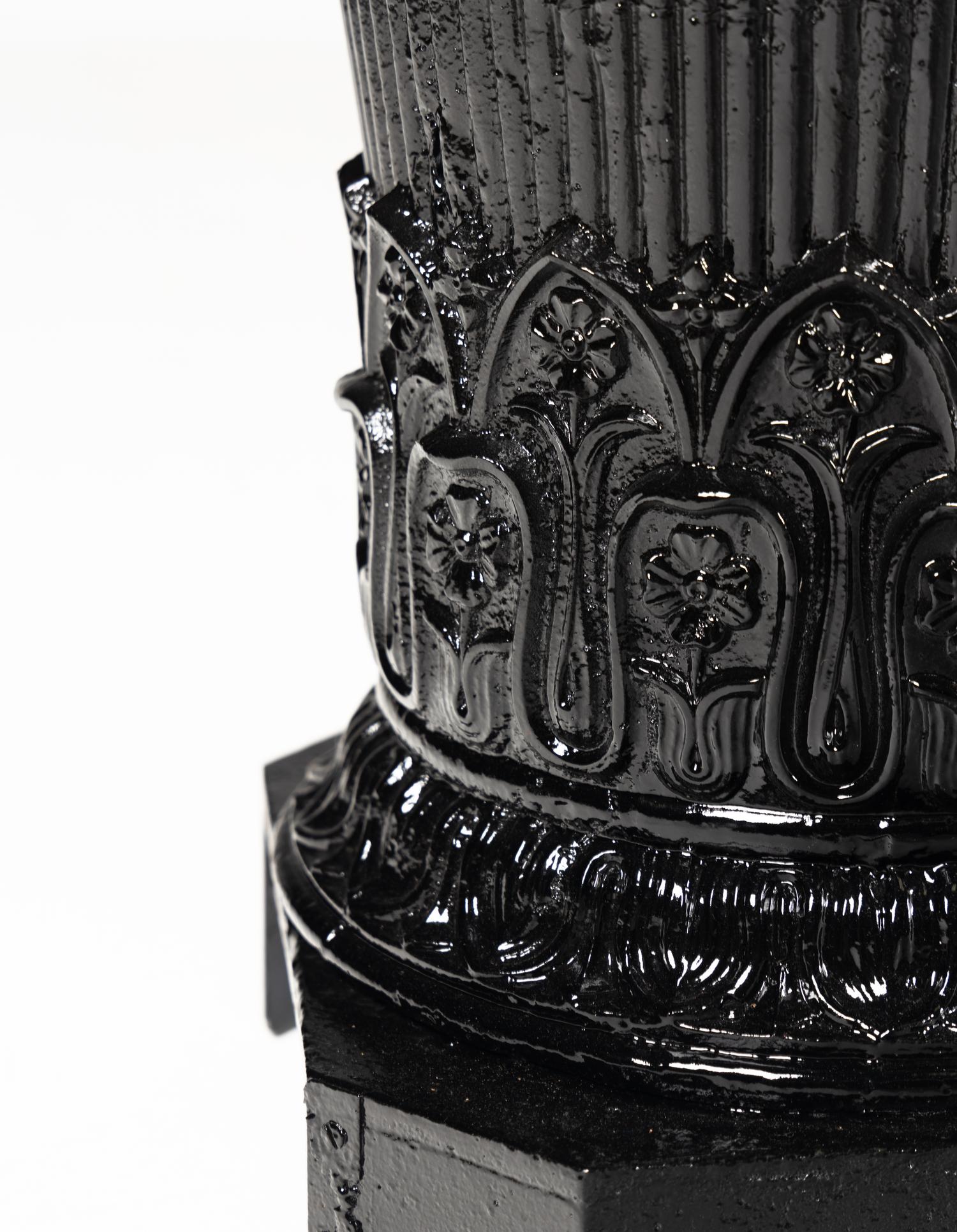 A Set of Four Painted Iron Jardinières
