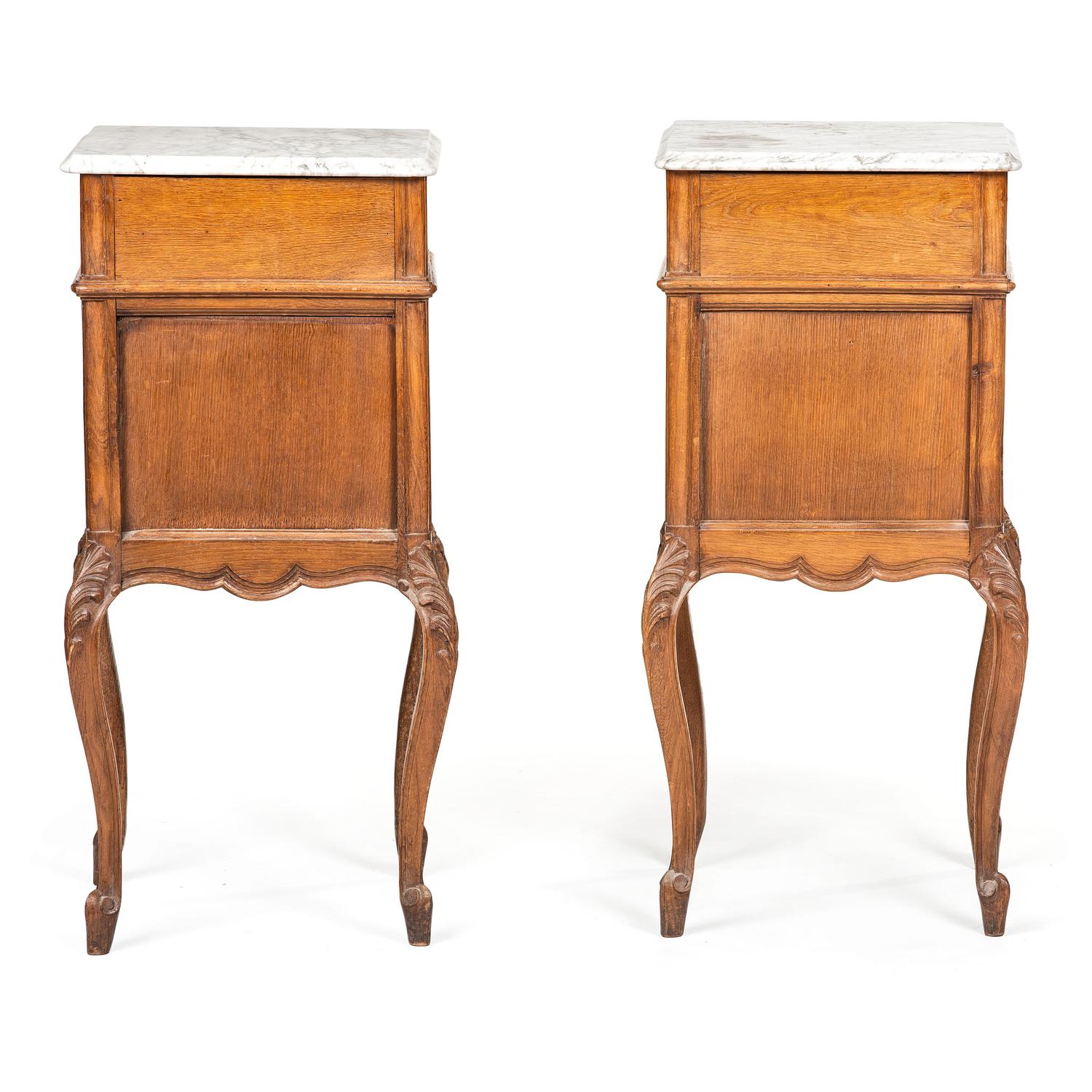 A Pair of Louis XV Provincial Style Carved Oak Marble Top Side Cabinets